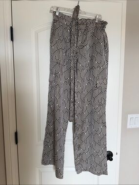 Sanctuary shiny satin high-waisted wide-legged cargo pants.